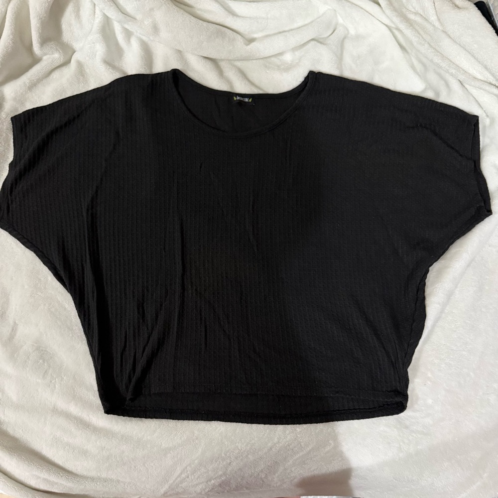 Black, bat-wing style top